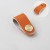 Möbelgriff Alerce – Leder-Schlaufengriff in Schwarz, Weiß, Orange, Rosa, Grau, Braun und Pastellgrün. 1-Loch-Montage oder 96 mm Lochabstand, Boho- und Skandi-Stil, ideal für Kindermöbel – egriffe.at