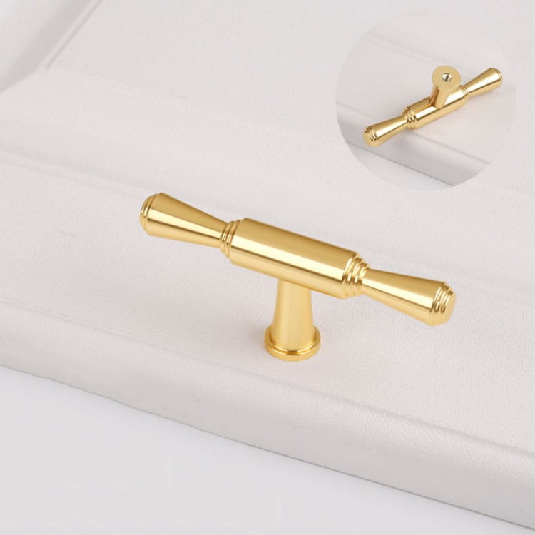 Möbelgriff Grava – T-Bar-Griff in Mattschwarz oder glänzendem Gold, erhältlich als Knopf sowie in 96, 128 und 192 mm. Ideal für Küchenschränke, Kommoden und Garderoben – egriffe.at