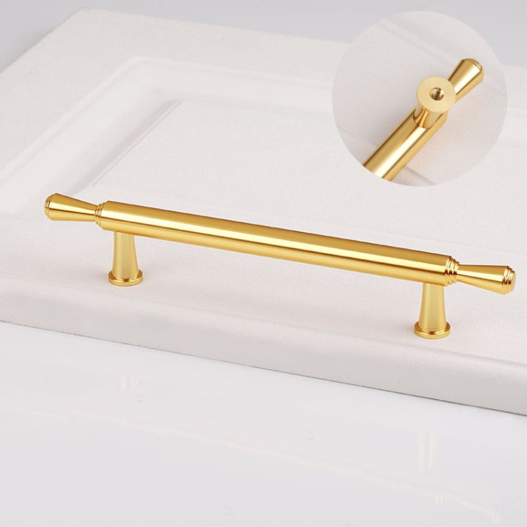 Möbelgriff Grava – T-Bar-Griff in Mattschwarz oder glänzendem Gold, erhältlich als Knopf sowie in 96, 128 und 192 mm. Ideal für Küchenschränke, Kommoden und Garderoben – egriffe.at