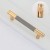 Möbelgriff Laure – goldener Leistengriff mit passendem Knopf und gerändelter Industrial-Oberfläche. Als Knopf sowie in 96, 128 und 256 mm erhältlich, ideal für Küchen-, Bad- und Büromöbel, Schränke und Schubladen – egriffe.at