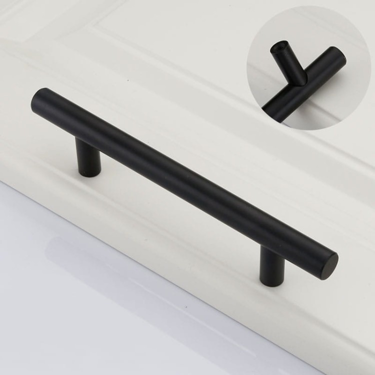 Möbelgriff Uno – T-Bar-Griff mit rundem Profil in Schwarz und gebürstetem Gold. Erhältlich als T-Bar-Knopf sowie in 96, 128, 160, 256, 512 und 850 mm – egriffe.at