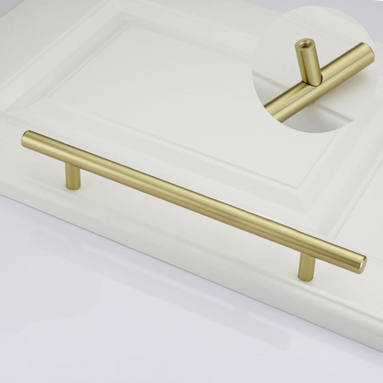 Möbelgriff Uno – T-Bar-Griff mit rundem Profil in Schwarz und gebürstetem Gold. Erhältlich als T-Bar-Knopf sowie in 96, 128, 160, 256, 512 und 850 mm – egriffe.at