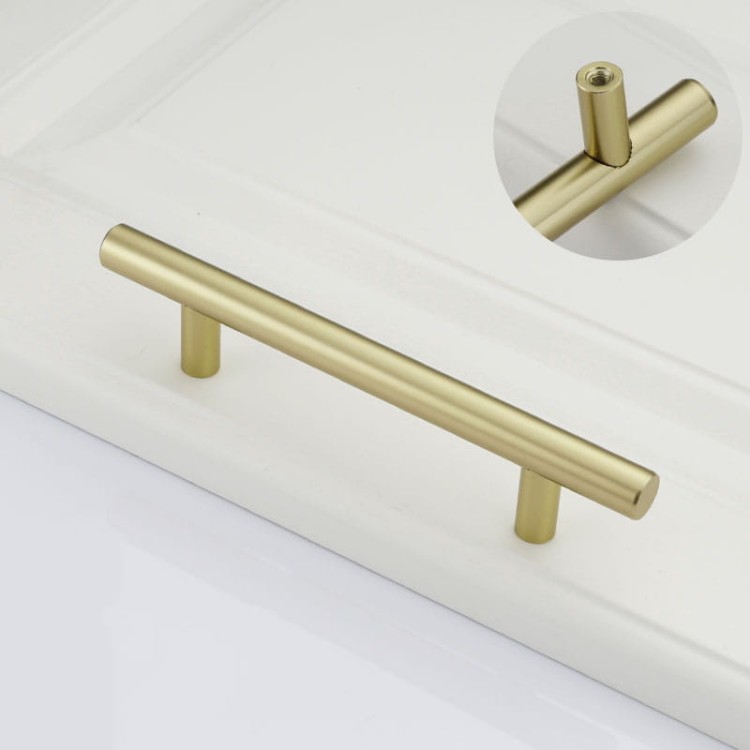 Möbelgriff Uno – T-Bar-Griff mit rundem Profil in Schwarz und gebürstetem Gold. Erhältlich als T-Bar-Knopf sowie in 96, 128, 160, 256, 512 und 850 mm – egriffe.at