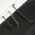 Möbelgriff Amarito – moderner Aufsatzgriff für Schränke und Schubladen in gebürstetem Gold, Schwarz, Perlgrau, gebürstetem Nickel, hellem Sandschwarz und Sandgold. Schlichter Küchengriff – egriffe.at.