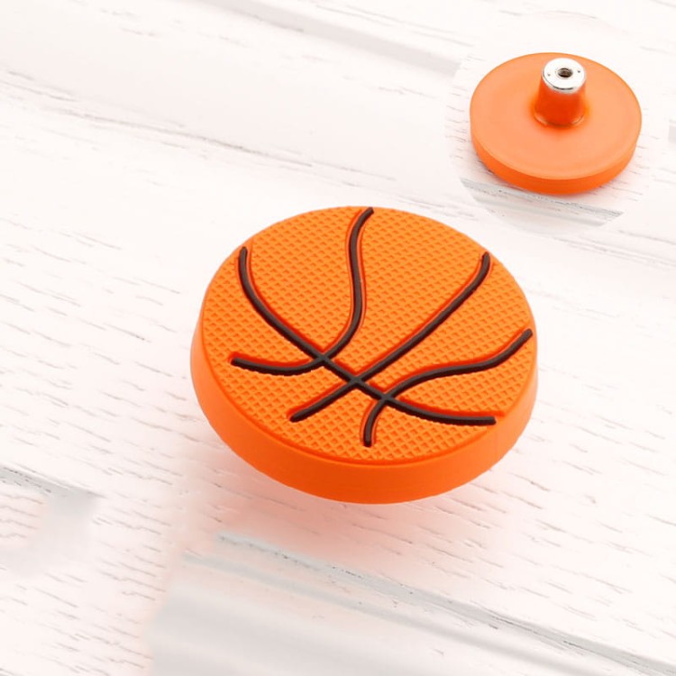 Kinder-Möbelgriff Basketball – orangefarbener Möbelknopf in Form eines Basketballs für Schränke und Kommoden im Kinderzimmer, erhältlich im Shop egriffe.at