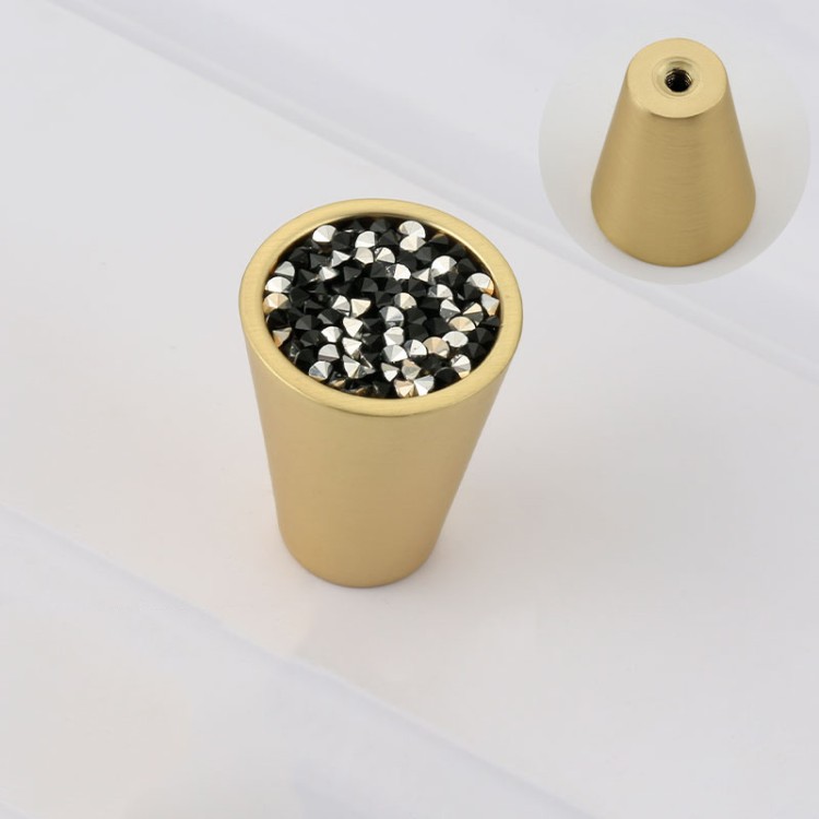 Möbelknopf Luiza mit trendigem schwarzem Terrazzo-Motiv und hellen Sprenkeln.