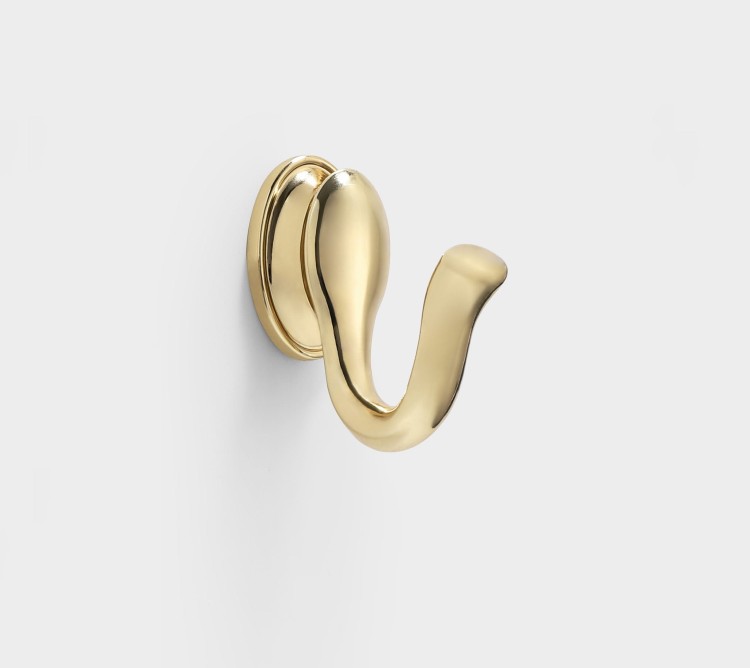 Wandhaken Tunas mit designerischer, geschwungener Form. Robust, feuchtigkeitsbeständig und leicht zu montieren, Schrauben im Set. Ideal für Bad, Küche, Garderobe und Büro. Farben: Metallicgrau, Gold und Schwarz-Gold.