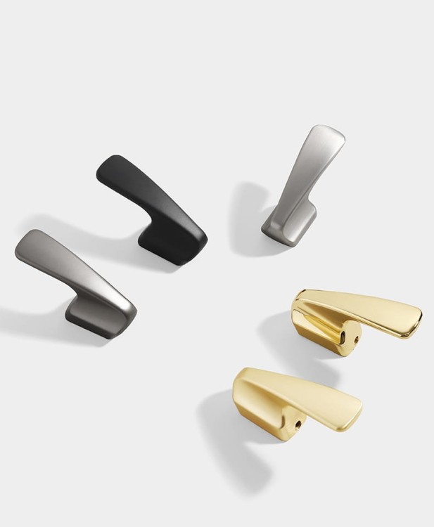 Wandhaken Alegre – moderne minimalistische Form aus robustem Material, einfache Montage. Ideal für Bad, Küche, Flur und Büro. Farben: Gold, Schwarz, gebürstetes Gold und Grau.