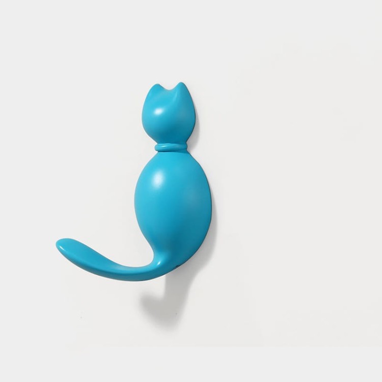 Niedlicher Wandhaken Gatito in Katzenform – ideal für Kinderzimmer und moderne Interieurs. Für Kleidung, Handtücher oder Schlüssel. Farben: Gold, Perlschwarz, Perlgrau, Gelb und Blau.