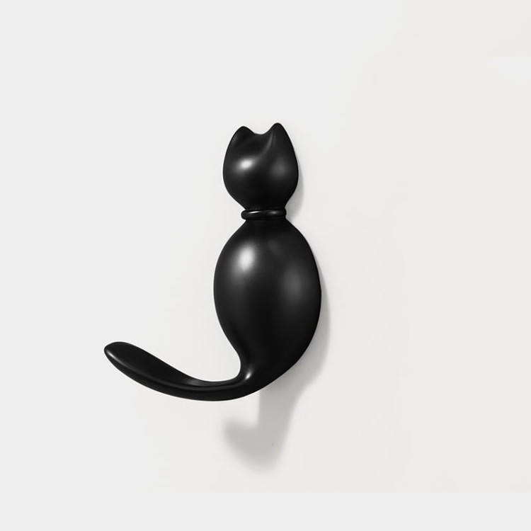 Niedlicher Wandhaken Gatito in Katzenform – ideal für Kinderzimmer und moderne Interieurs. Für Kleidung, Handtücher oder Schlüssel. Farben: Gold, Perlschwarz, Perlgrau, Gelb und Blau.