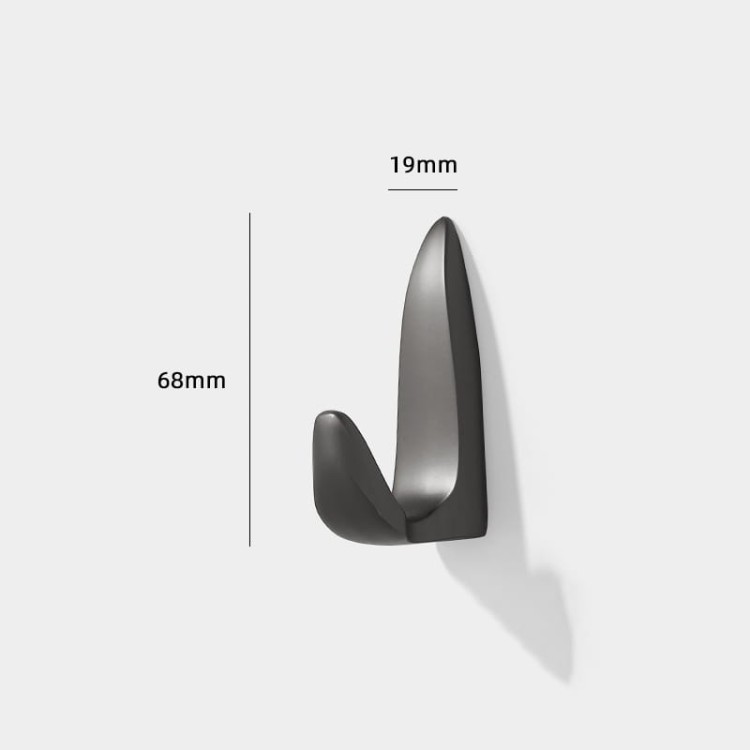 Wandhaken Gordo mit modernem minimalistischem Design. Robust, kratzfest und einfach mit Schrauben zu montieren. Ideal für Zuhause, Büro oder Bad. Farben: Gold, Schwarz und Perlgrau.