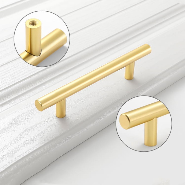 Möbelgriff Alma – schlichter zylindrischer T-Bar-Griff in Gold, Champagnergold oder Schwarz, passend für moderne und klassische Interieurs. Viele Größen für Kommoden, Schränke, Garderoben und Badmöbel.
