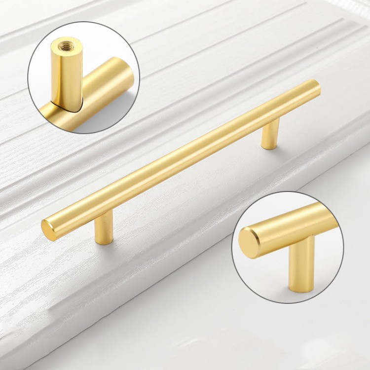 Möbelgriff Alma – schlichter zylindrischer T-Bar-Griff in Gold, Champagnergold oder Schwarz, passend für moderne und klassische Interieurs. Viele Größen für Kommoden, Schränke, Garderoben und Badmöbel.