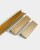 Möbelgriff Bravo – L-Kantengriff aus feuchtigkeitsbeständigem Aluminium. Farben: gebürstetes Gold, Schwarz, Silber und Grau. Größen 96, 128, 160, 192, 224 und 800 mm. Für moderne, minimalistische und industrielle Interieurs.