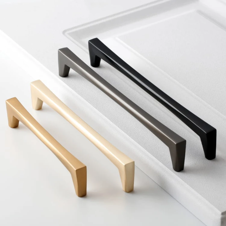 Uchwyt meblowy Mela – nowoczesny, klasyczny, minimalistyczny uchwyt w kolorach: czarnym, złotym szczotkowanym, nikiel szczotkowany, szary perłowy; rozmiary 128–256 mm, idealny do mebli kuchennych, łazienkowych, garderoby i komód